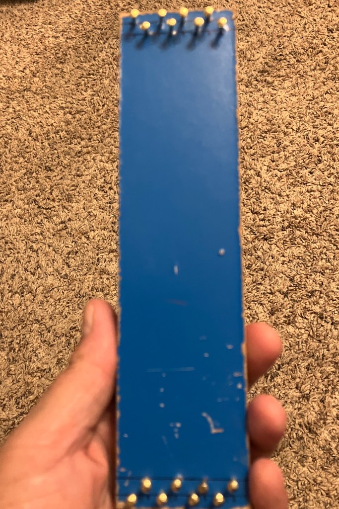 A mini loom (unstrung) made b y fiber artist, Sarah Batchelder