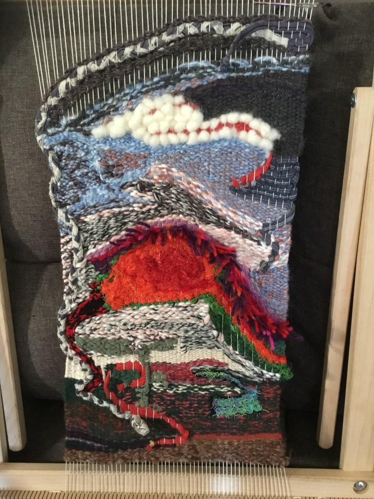 Unfinished tapestry depicting a snake’s head